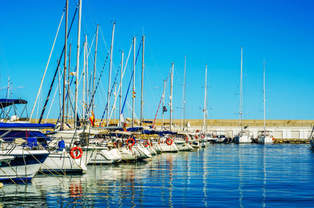 TORREDEMBARRA, SPAIN - SEPTEMBER 10, 2017   A beautiful marina with luxury yachts and motor boats in...