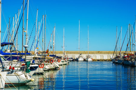 TORREDEMBARRA, SPAIN - SEPTEMBER 10, 2017   A beautiful marina with luxury yachts and motor boats in...