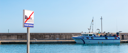 TORREDEMBARRA, SPAIN - SEPTEMBER 10, 2017   A beautiful marina with luxury yachts and motor boats in the tourist seaside town of Torredembarraのeditorial素材