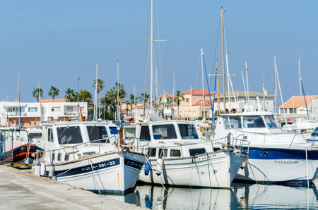 CABO DE PALOS, SPAIN - FEBRUARY 8, 2019   A beautiful marina with luxury yachts and motor boats in the tourist seaside town near of Cartagenaのeditorial素材