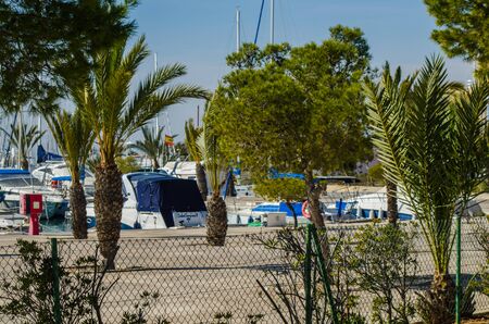 LA MANGA, SPAIN - MARCH 4, 2019   A beautiful marina with luxury yachts and motor boats in the tourist seaside town near of San Javierのeditorial素材
