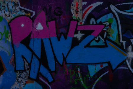 LONDON, UK - MAY 21, 2019 Grafitti on the wall in the city park, a place for legal painting with spray paints, street paintingのeditorial素材