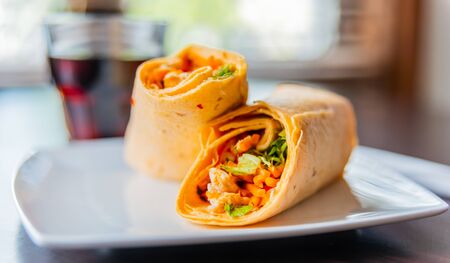 Chicken breast with piri piri sauce and lettuce in a chili tortilla wrap, tasty foodの写真素材