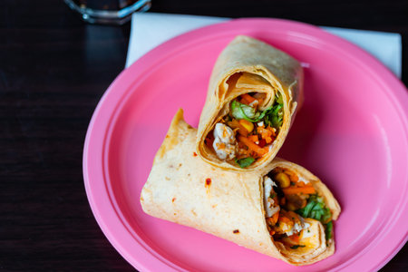 Chicken breast with piri piri sauce and lettuce in a chili tortilla wrap, tasty food