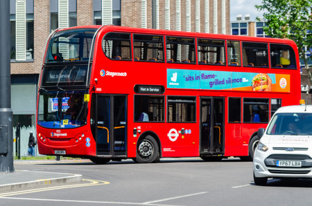 LONDON, UK - MAY 21, 2019 A typical urban transport vehicle driving through London street, the...