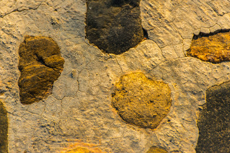 old stone placed in the wall, interesting and original background, solid wall