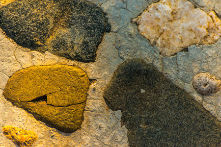 old stone placed in the wall, interesting and original background, solid wall