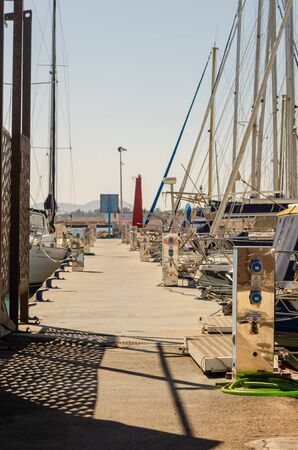 LOS ALCAZARES, SPAIN - FEBRUARY 25, 2019  A beautiful marina with yachts and motor boats in the tourist seaside town near of San Javierのeditorial素材