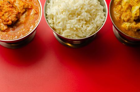 Mild chicken Korma and chicken Tikka Masala with Basmati rice, Indian foodの写真素材