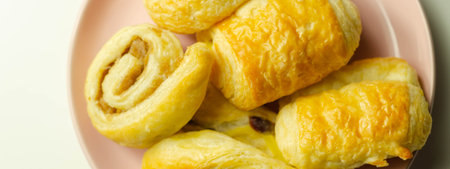 Set of various traditional pastry sweet mini Danish on the plate, delicious desserts