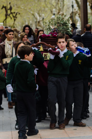 VELEZ-MALAGA, SPAIN, MARCH 24, 2018 Children participating in the procession associated with the...