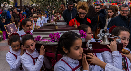 VELEZ-MALAGA, SPAIN, MARCH 24, 2018 Children participating in the procession associated with the...