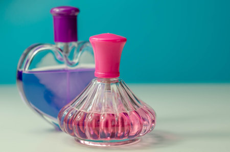 Luxurious floral perfumes in interesting bottle shapes, charming fragrances for women, glamour and elegance aromaticの写真素材