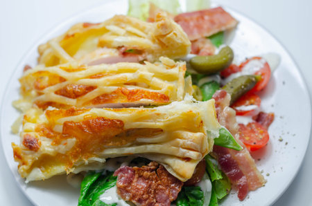 Chicken en croute, chicken breast inner fillets with mature cheddar cheese and beechwood smoked...