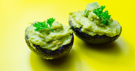 Smashed avocado,  smother avocado with lemon juice served on the for brunch, organic foodの写真素材