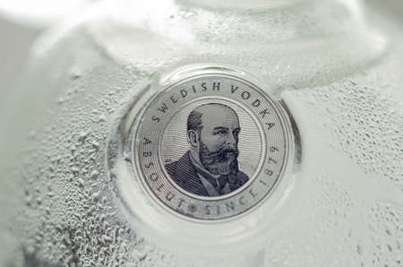 LONDON, UNITED KINGDOM - AUGUST 10, 2021 Bottle of Absolut vodka blue, produced from winter wheat and deep waters, crystal clear vodka from southern Swedenのeditorial素材