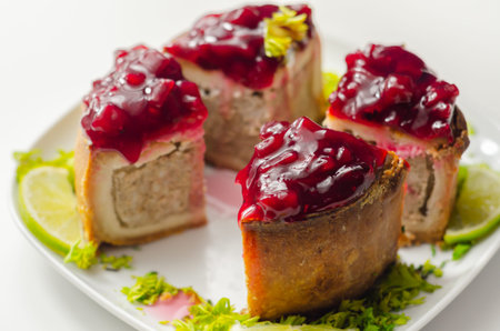 Seasoned British pork, wrapped in crisp, flavoursome pastry served with  beetroot and orange chutney...