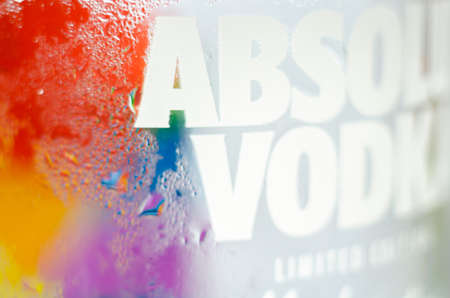 LONDON, UNITED KINGDOM - AUGUST 20, 2021 Bottle of Absolut vodka blue with a limited label with the rainbow flag, produced in Sweden, LGBT prideのeditorial素材