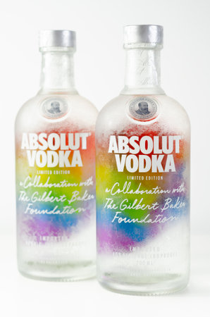 LONDON, UNITED KINGDOM - AUGUST 20, 2021 Bottle of Absolut vodka blue with a limited label with the rainbow flag, produced in Sweden, LGBT prideのeditorial素材