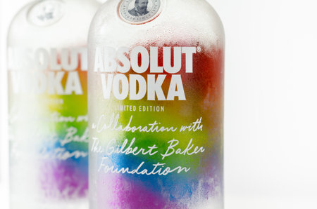 LONDON, UNITED KINGDOM - AUGUST 20, 2021 Bottle of Absolut vodka blue with a limited label with the rainbow flag, produced in Sweden, LGBT prideのeditorial素材