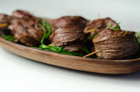 Juicy beef, fried and cooked in the shape of a rose, creatively served meat, meat flowerの写真素材