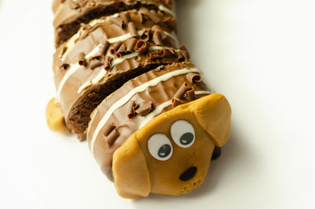 Dachshund cake, chocolate sponge cake with chocolate flavoured buttercream, covered with a milk...