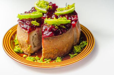 Seasoned British pork, wrapped in crisp, flavoursome pastry served with  beetroot and orange chutney...