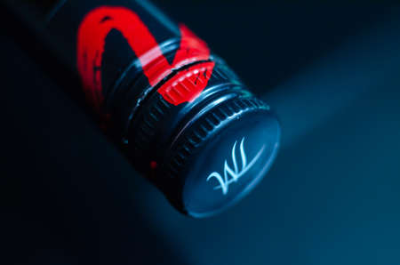 LONDON, UNITED KINGDOM - NOVEMBER 14, 2021 A closeup of a bottle of dark coffee liquor, famous alcohol known for its delicious taste,  made from rum, coffee arabica and vanillaのeditorial素材