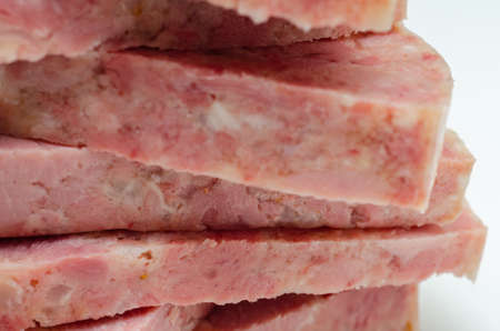 Thick slices of delicious brawn, cold cut made with flesh from the head of a pig in aspic, traditional headcheeseの写真素材