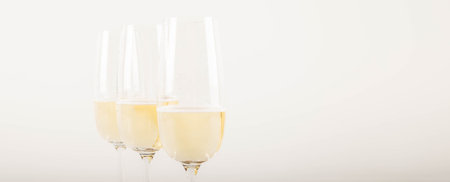 Luxurious champagne in a glass, festive way of celebrating a new year or important events, toast with sparkling wine, bubblesの写真素材