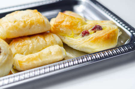 Set of various traditional pastry sweet mini Danish on the silver tray, delicious dessertsの写真素材