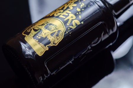 LONDON, UNITED KINGDOM - JANUARY 23, 2022 Interesting spiced blended rum from St. Ives in Cornwall in the characteristic bottle with a skull imageのeditorial素材