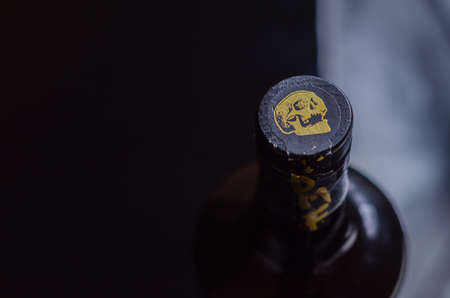 LONDON, UNITED KINGDOM - JANUARY 23, 2022 Interesting spiced blended rum from St. Ives in Cornwall in the characteristic bottle with a skull imageのeditorial素材