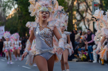 CARTAGENA, SPAIN - MARCH 2, 2019 A colorful carnival parade organized by the inhabitants of a famous...