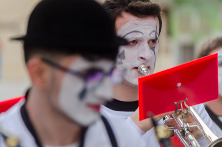 NERJA, SPAIN - FEBRUARY 26, 2022 Colorful carnival parade organized by the inhabitants of a famous...