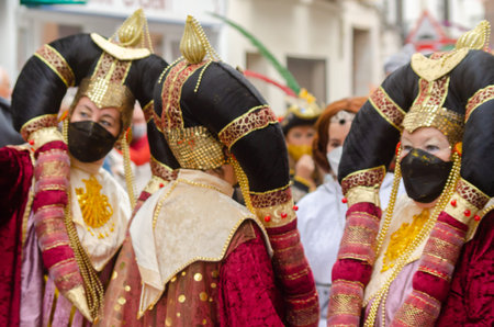 NERJA, SPAIN - FEBRUARY 26, 2022 Colorful carnival parade organized by the inhabitants of a famous...