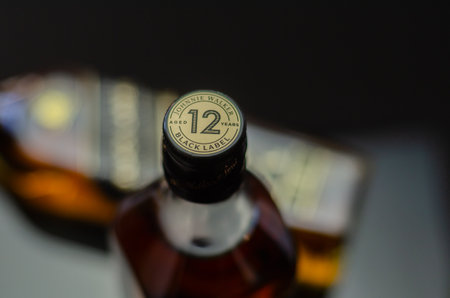LONDON, UK - 15 JUNE 2023 Johnnie Walker Black Label scotch whiskey, a whiskey with a taste of smooth and creamy toffee, rich and sweet fruit and spicy vanilla, all wrapped in the sweet smokeのeditorial素材
