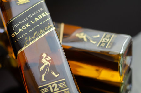 LONDON, UK - 15 JUNE 2023 Johnnie Walker Black Label scotch whiskey, a whiskey with a taste of smooth and creamy toffee, rich and sweet fruit and spicy vanilla, all wrapped in the sweet smokeのeditorial素材
