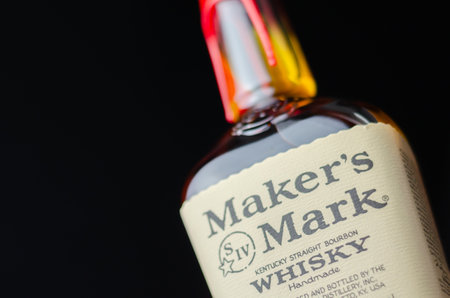 LONDON, UNITED KINGDOM - JULY 24, 2022 The original Maker's Mark in a characteristic squarish bottle sealed with red wax, famous American whiskyのeditorial素材