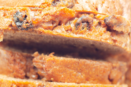 Freshly made spiced fruit  loaf cake  on the white  background, 
traditional British cakeの写真素材