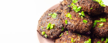 Fried minced cutlets served in a pile on a plate, typical eastern european homemade food, tasty dishの写真素材