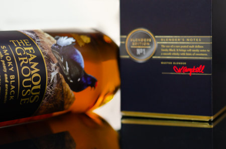 LONDON, UNITED KINGDOM - AUGUST 28, 2022 The Famous Grouse Smoky Black, a complex blend with hints of dried fruit and soft smoky notes, smooth, peaty, and aromaticのeditorial素材