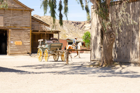 ALMERIA, SPAIN - 03 APRIL 2023 A show in an American town styled like the Wild West, located in the natural landscape of the Tabernas desert in Almeriaのeditorial素材