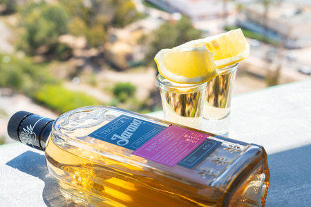 ALMERIA, SPAIN - 16 MAY 2024 A bottle of Tequila Jarana Reposado Agave Azul made from the finest...