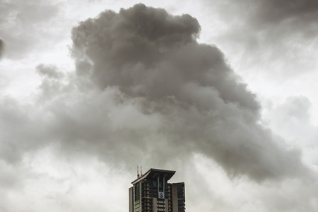 Kuala Lumpur - 24 November 2017 : Menara 1 Bukit Aman, headquarters for Royal Malaysian Police under cover of storm cloudのeditorial素材