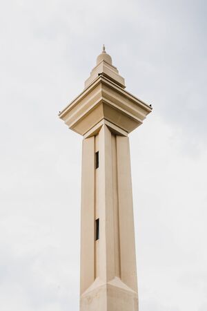 Shah Alam - 25 November 2017 : Minaret against storm cloud backdrop at Masjid Diraja Tengku Ampuan Jemaahのeditorial素材