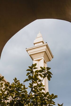 Shah Alam - 25 November 2017 : Minaret against storm cloud backdrop at Masjid Diraja Tengku Ampuan Jemaahのeditorial素材