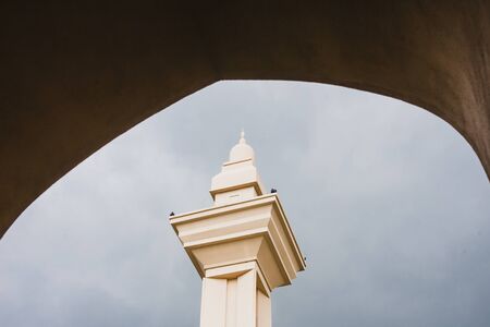 Shah Alam - 25 November 2017 : Minaret against storm cloud backdrop at Masjid Diraja Tengku Ampuan Jemaahのeditorial素材