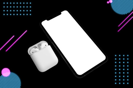 Neon Phone & Headphones With Black Background