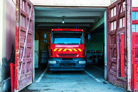 Fire truck in the garageの写真素材